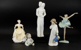 A Collection Of Ceramic Figures Five in total to include two Nao figures the first in the form of a