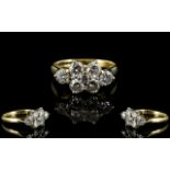 18ct Gold Pleasing 7 Stone Diamond Cluster Dress Ring of good colour and sparkle to all diamonds.