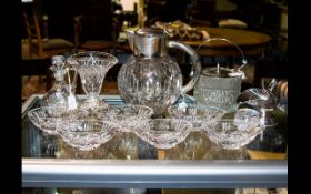 A Collection Of Cut Glass Twelve items in total to include plated top ice bucket, plated salt pig,