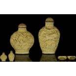 Chinese 19thC Pair of Well Carved Ivory Snuff Bottles of good form and quality. Character marks to