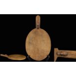 Robert Thompson of Kilburn 'Mouseman' oak oval cheese board with carved mouse signature,