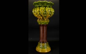 A Bretby Majolica Jardiniere Art nouveau foliate design jardiniere in green and cartreuse glaze,