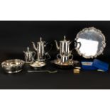 Collection of Silver Plated Ware to include four piece teaset, scalloped edge dish on pedestal feet,