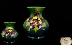 Moorcroft Small Globe Shaped Tubelined Vase, 'Columbine' design,