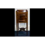 A Bedside Cabinet comprising gallery top above mahogany cupboard with cross stretcher,