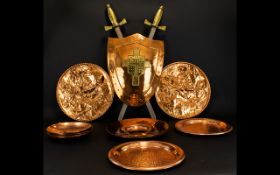 A Collection Of Brass And Copper Plaques And Plates to include several chargers, bowls,