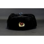 Soviet Ushanka Hat Traditional trapper hat in black faux fur with quilted cotton lining and enamel