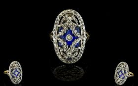 A Victorian Marcasite And Enamel Ring Oval ring with fleur de lys shoulder detail, the central