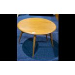 Ercol Small Single Drop Leaf Table - Light elm / ash, circular form, turned supports.