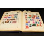 Stamp Interest: Very well filled blue Strand stamp album with strength in lots of countries. Lots of