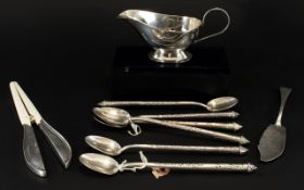 A Small Collection Of Mixed Metal Items To include glove stretchers, gravy boat,