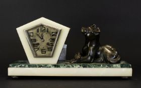 Art Deco Marble Figural Mantle Clock Raised on rectangular base of cream and moss green veined Verdi