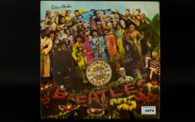 The Beatles SGT Pepper L.P. With Autograph Of Designer Peter Blake on Cover.