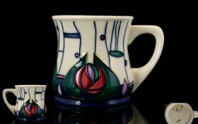 Moorcroft Modern Tubelined Stylised Design Cup in first quality mint condition.