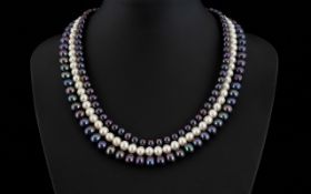 Danbury Mint 3 Strand Pearl Necklace with Silver Clasp. Marked 925. 18 Inches In length.