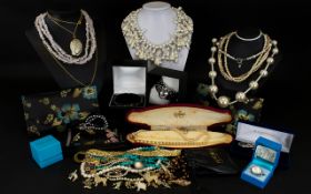 A Mixed Collection Of Costume Jewellery Comprising pendants, cufflinks,