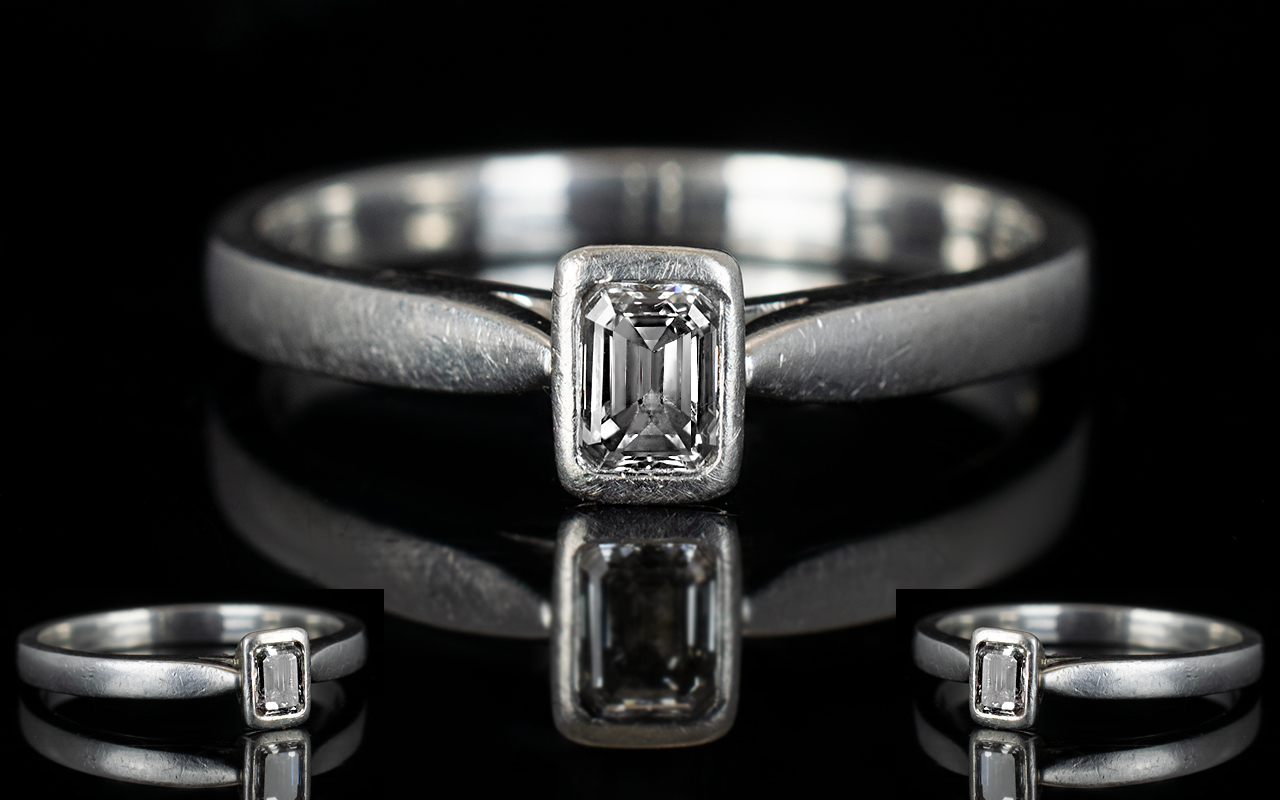 Platinum Set Contemporary Single Stone Diamond Ring the step cut diamond of top colour and clarity