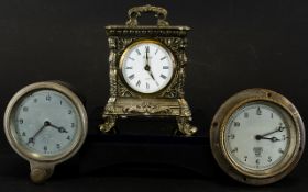 Two Cockpit/Motorcar Clocks Each marked 'Smiths' with white dial and Arabic numerals.