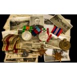 WWII Interest A Set Of Four Military Medals To include the war medal, Italy star,