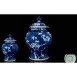 A 20th Century Blue And White Ginger Jar With Cover Blue ground with prunus design, good condition,