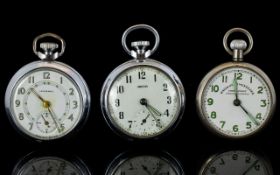 Three Open Faced Pocket Watches All with white dial and Arabic numerals, marked 'Smiths',