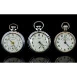 Three Open Faced Pocket Watches All with white dial and Arabic numerals, marked 'Smiths',