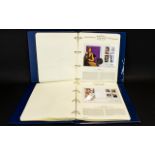 Two of The Royal Family Westminster Albums containing around 27 coin cases with mostly crown/five