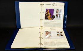 Two of The Royal Family Westminster Albums containing around 27 coin cases with mostly crown/five