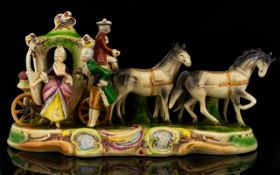 German Pottery Figure Group In the form of a coach and horses with figures on scrolling oval base.