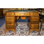 Twin Pedestal Writing Desk Comprising inset leather top, 3 frieze drawers, each pedestal with