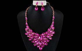 Shocking Pink Crystal Statement Necklace and Drop Earrings, the front of the necklace having