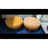 A Pair of Circular Foot Stools raised on turned legs,