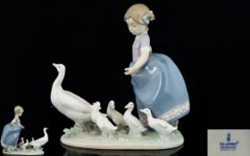 Lladro Handpainted Porcelain Figure 'Hurry Now'. Issued 1988-2004. Model No. 5503.