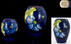 Moorcroft Tubelined Ovoid Vase, 'Clematis' variation design,