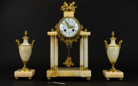 A Late 19th Century Onyx Garniture Clock Set French movement Marked Samuel Marti,