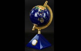 Small Decorative Globe and Clock.