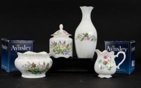 Collection of Aynsley China includes boxed bud vase; candle in bowl;