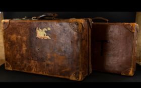 Two Vintage Travelcases Large tan leather case of traditional construct with aged patina,