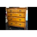 Maple Front Chest Of Drawers Four long drawers with brass pull handles, raised on bracket feet,