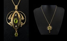 Art Nouveau 9ct Gold Pendant. c.1900, Set with Peridot, Seed Pearl and Diamonds.