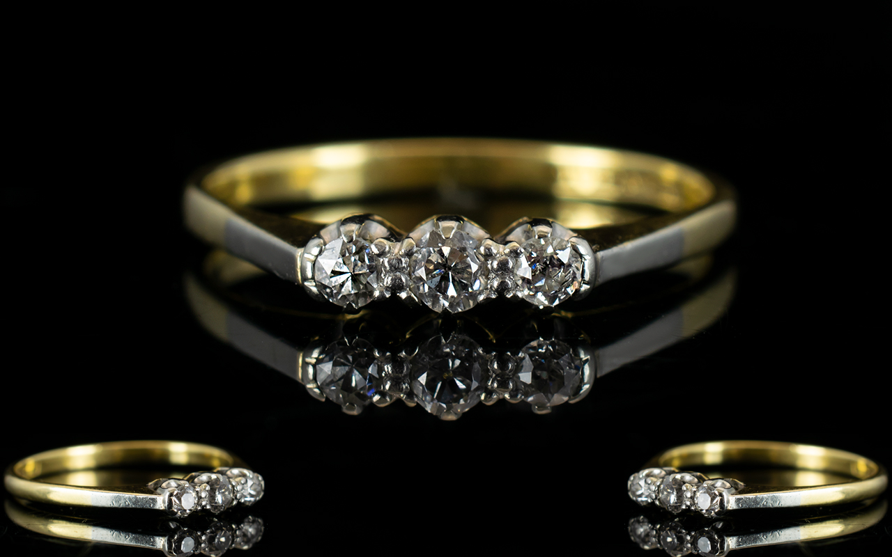 Antique Period 18ct Gold and Platinum Set 3 Stone Diamond Ring marked 18ct and platinum.