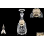 A Good Quality Lead Crystal Decanter with Attached Two Hallmarked Silver Spirit Labels,