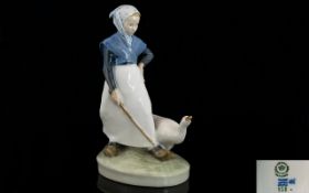 Royal Copenhagen Vintage Figure 'Woman with Goose' circa 1955, model 528.