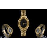 Roy King Attractive 1980's Mechanical Wind 9ct Gold Bracelet Watch with oval shaped black dial,