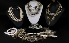 A Large Mixed Quantity Of Costume Jewellery And Dress Watches Varied bag to include several beaded