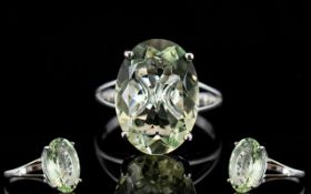 Green Amethyst Solitaire Ring, a 10ct oval cut solitaire green amethyst,