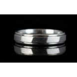 Platinum Wedding Band contemporary design, London hallmark for 2000. 10.2 grams. Ring size V.