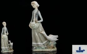 Lladro Porcelain Figurine ' Girl with Goose ' Model 4815. Issued 1972 - 1991. Height 12.25