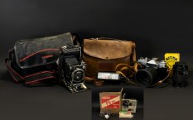 Zenit Em 35mm Camera Together with two lenses and accessories in camera bag.