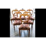 Six Balloon Back Dining Chairs each with turned legs,